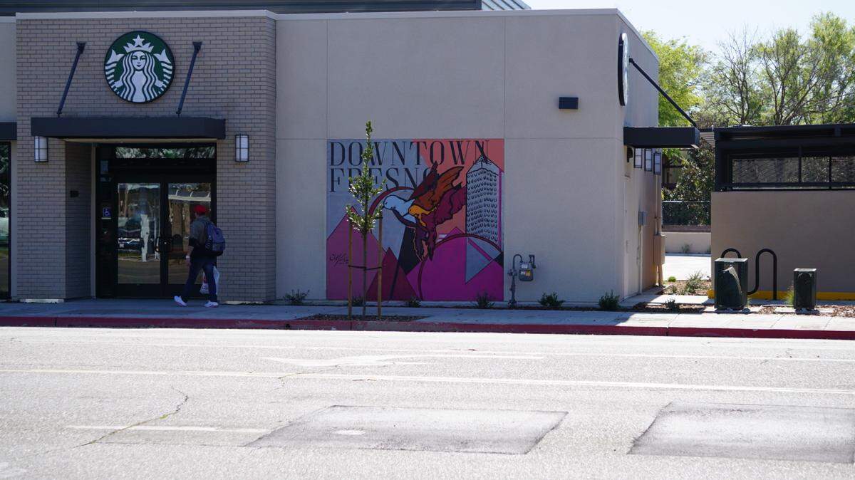 The new Starbucks on Tulare Street in downtown Fresno features a mural of hummingbirds on one of its walls.