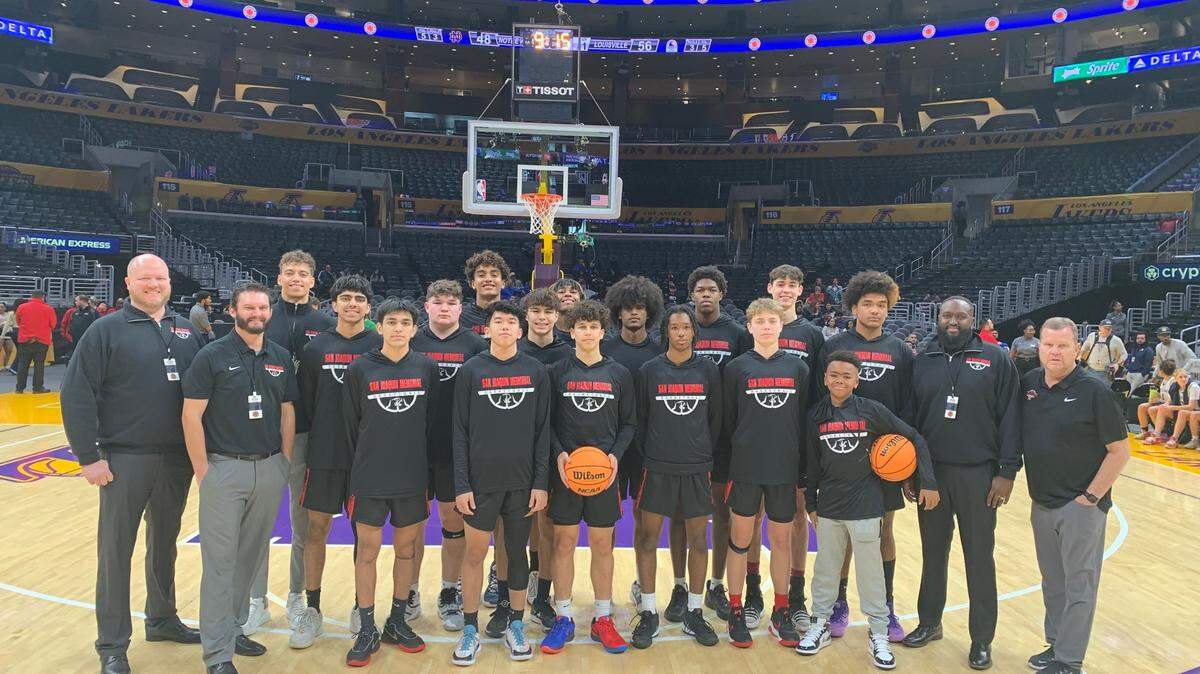 The San Joaquin Memorial boys basketball team poses for a photo on the Los Angeles Lakers’ homecourt on Saturday, Jan. 6, 2024.