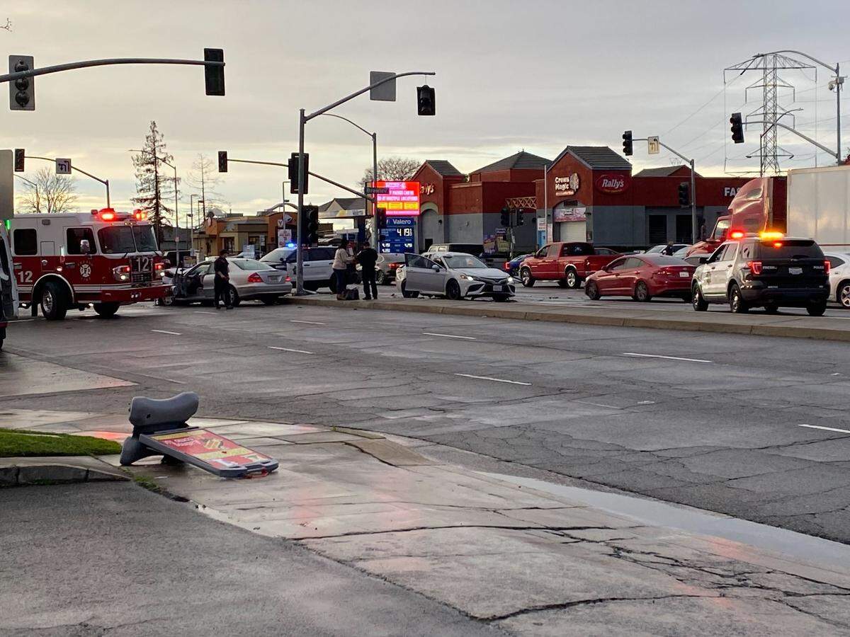 First responders check on a two-vehicle collision at Shaw and Brawley avenues, where the traffic lights were out. The injuries appear to be a minor, and traffic was backed up on Shaw.