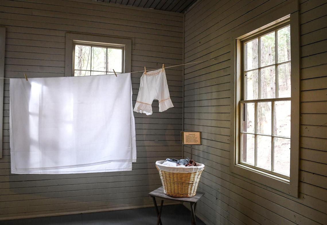 Laundry hangs on a clothesline illustrating the nature of work once done in the Chinese Laundry Building near the Yosemite History Center in Yosemite’s Wawona on Tuesday, Sept. 28, 2021. The building is being dedicated in honor of its original purpose as a laundry building for the Wawona Hotel and the Chinese immigrants who ran it.
