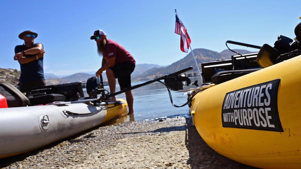 Adventures With Purpose lead diver Nick “Rattlesnake” Rinn, left, and team leader Doug Bishop, right, prepare to launch to begin their search for Jolissa Fuentes at Pine Flat Lake’s Deer Creek marina Friday morning, Aug. 26, 2022 in Fresno. The team search Avocado Lake on Thursday.