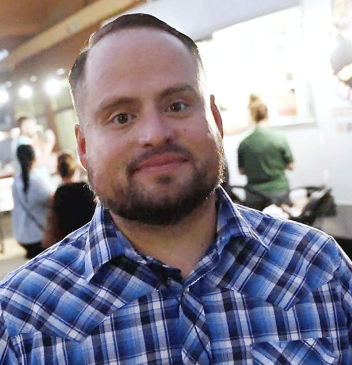 Armando Arias Jr. is interviewed outside his food truck Tacos El Cabezon, parked at Shaw and Maroa avenues Wednesday, Sept 24, 2025 in Fresno.