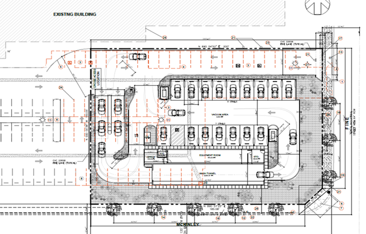 The site plan for a proposed car wash at the northwest corner of McKinley and Fine avenues in east-central Fresno included a drive-through wash tunnel along McKinley Avenue, as well as stalls where customers could vacuum out their vehicles. It would have been adjacent to a building, at the top of this image, that houses several businesses including a community day center for autistic and other special-needs clients.