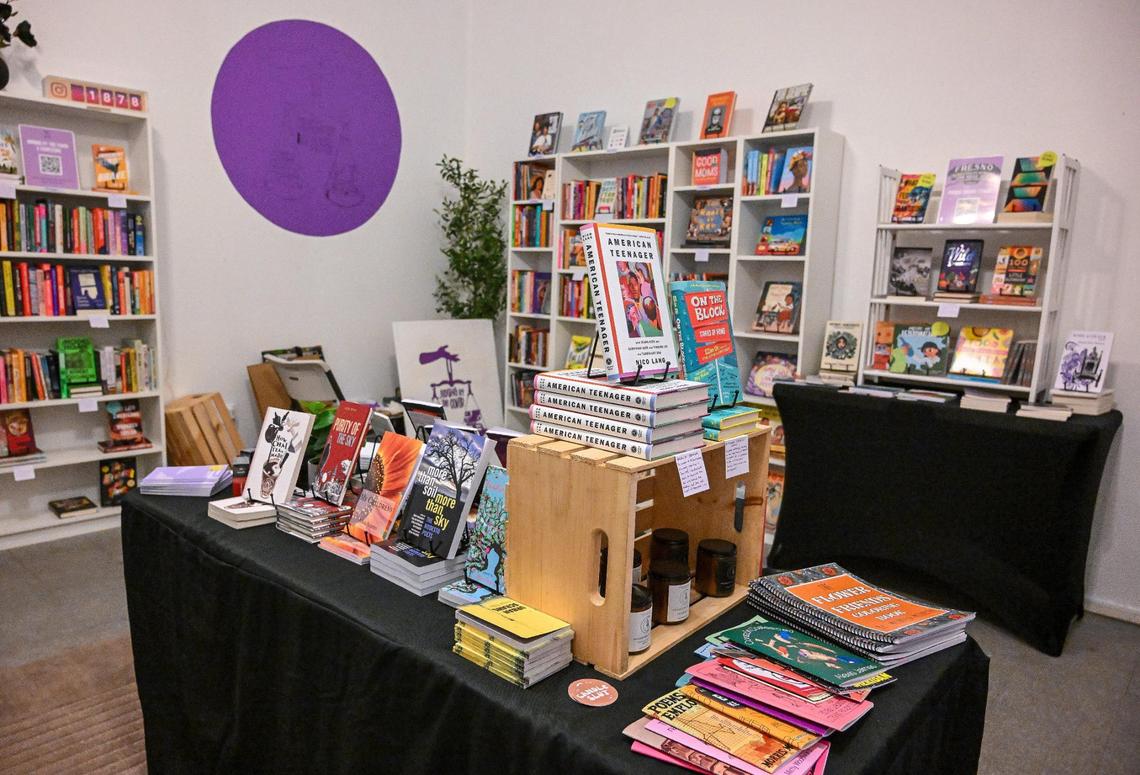 Book titles are displayed at Judging by the Cover, an indie bookstore that recently opened in Fresno’s Chinatown.