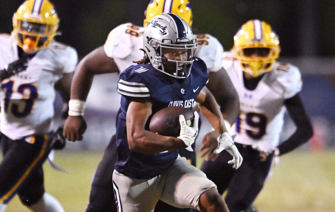 Clovis East’s Lindsey Graves, center, is chased by Grant Union’s defense Friday, Sept. 13, 2024 in Clovis.