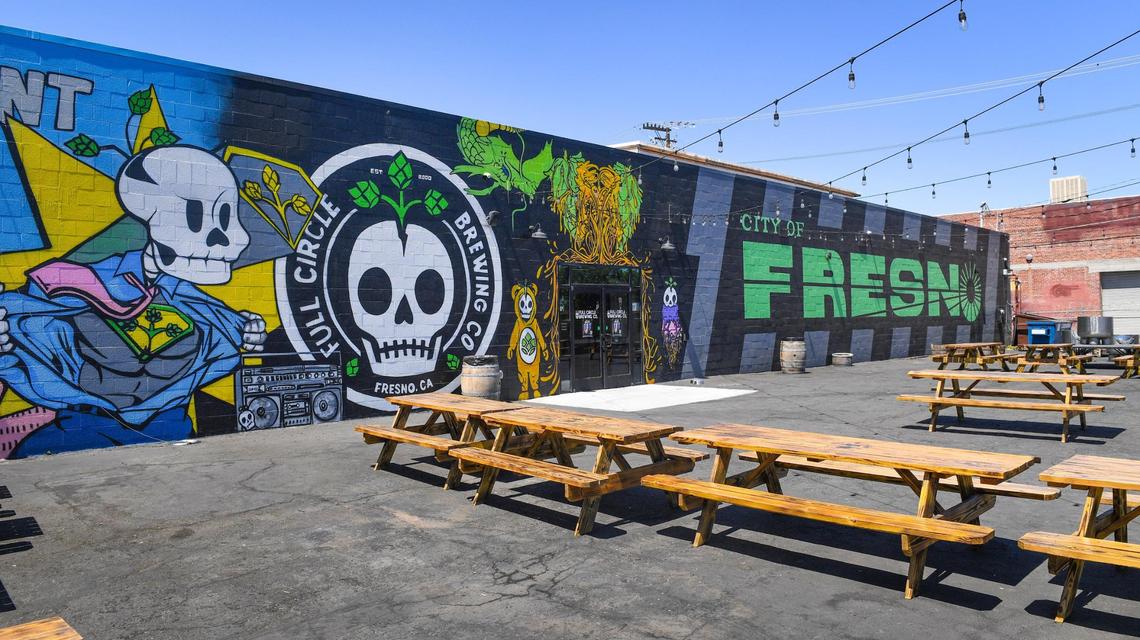 The outdoor patio at Full Circle Brewing on Fulton Street includes a giant mural.