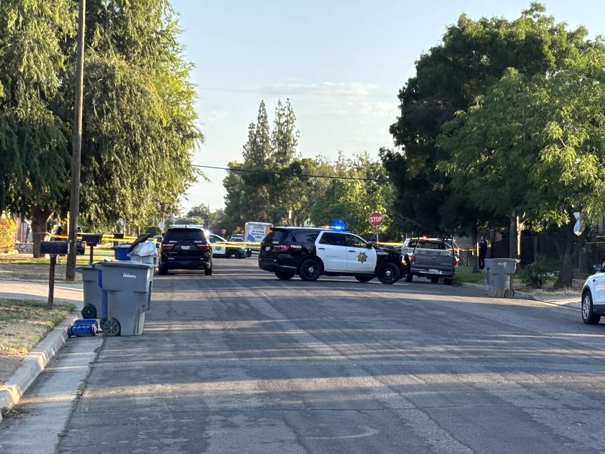 Officers closed off a portion of the road near San Pablo and Herndon avenues amid an investigation in a reported shooting Tuesday morning, July 14, 2026, in Fresno.