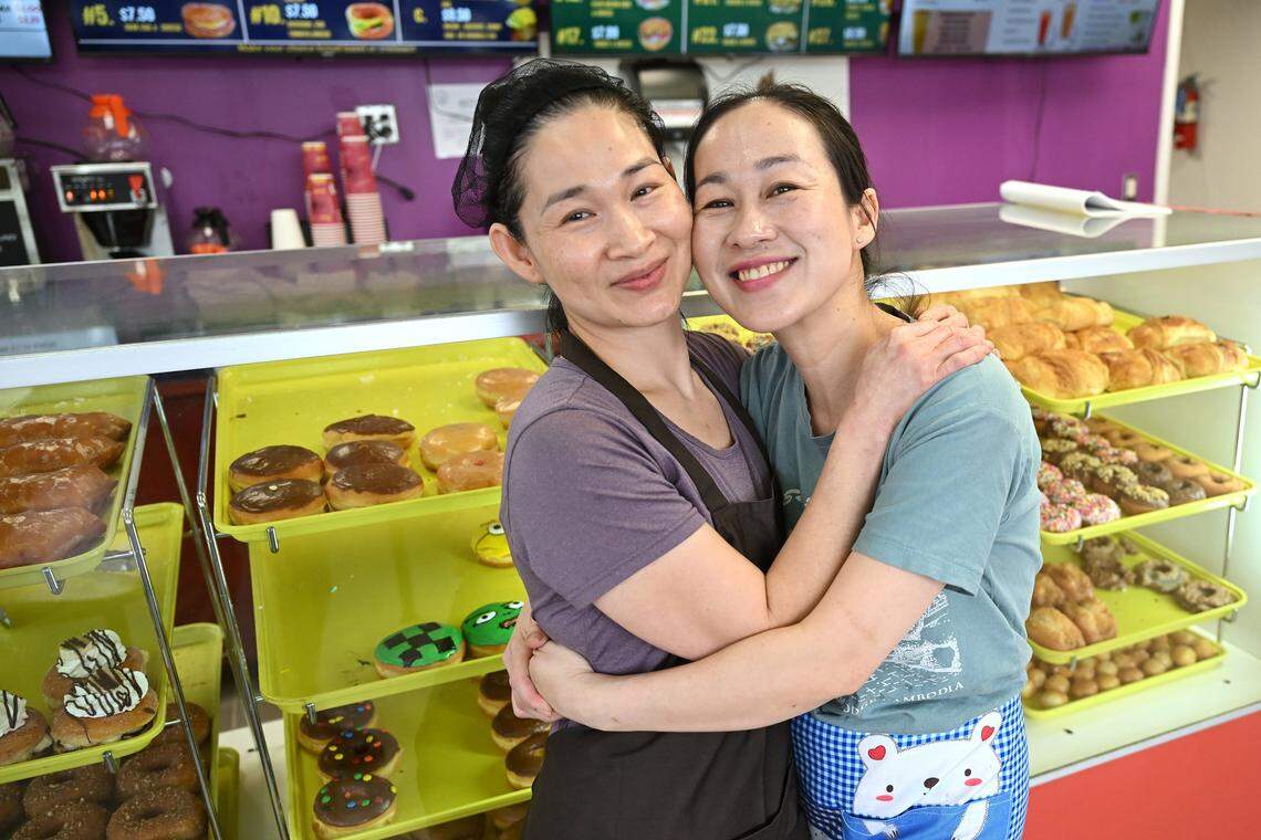 Thida Ky, left and her sister Thary Ky have opened City Donuts in the former Supreme Donuts location at the corner of Palm and McKinley avenues, expanding the menu to include bagel and croissant sandwiches. Photographed Wednesday, Oct. 22, 2025 in Fresno.