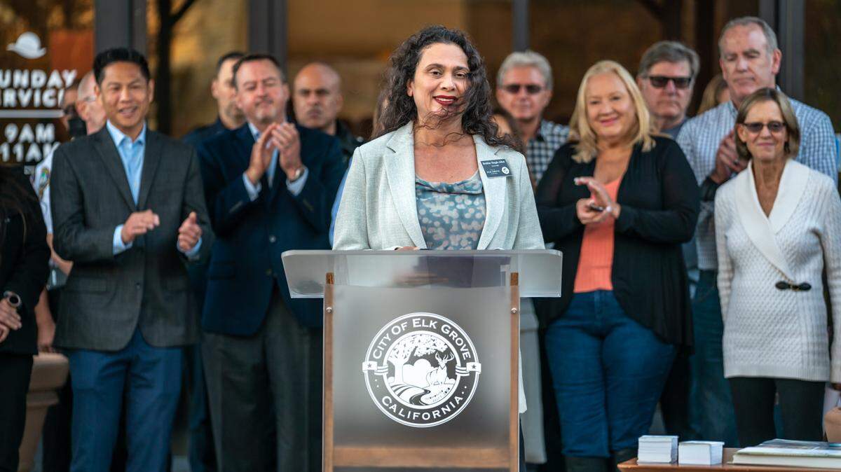 Elk Grove Mayor Bobbie Singh-Allen announces the city’s plans to open winter warming centers starting in December for the unhoused during a news conference Wednesday, Nov. 17, 2021, outside Sun Grove Church in Elk Grove, Calif.