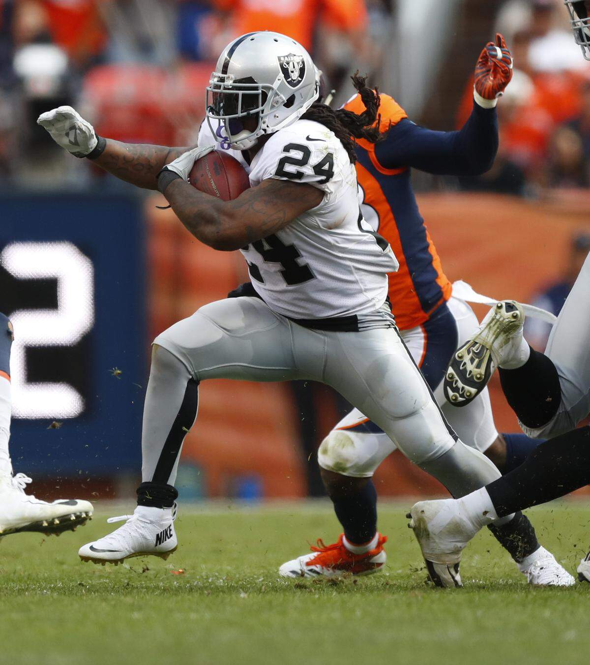 Oakland Raiders running back Marshawn Lynch (24) runs against the Denver Broncos during the second half of an NFL football game, Sunday, Sept. 16, 2018, in Denver.