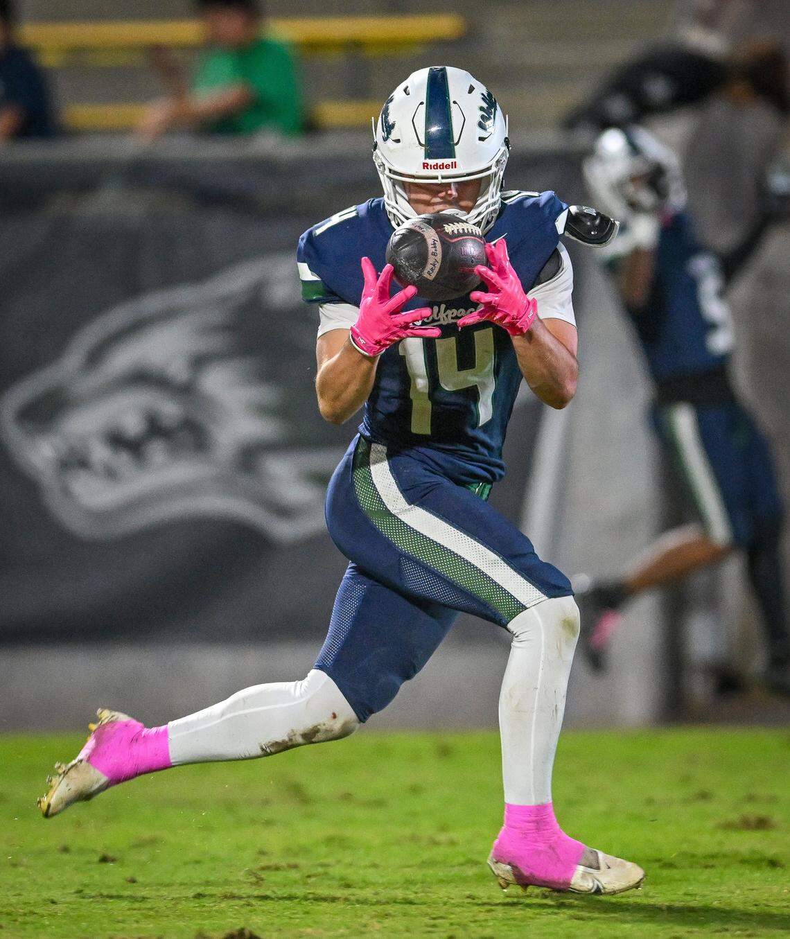 Clovis East's Elijah Wilson bobbles the ball but is able to come down with it for a touchdown against Clovis during their game at Lamonica Stadium in Clovis on Friday, Oct. 17, 2025.
