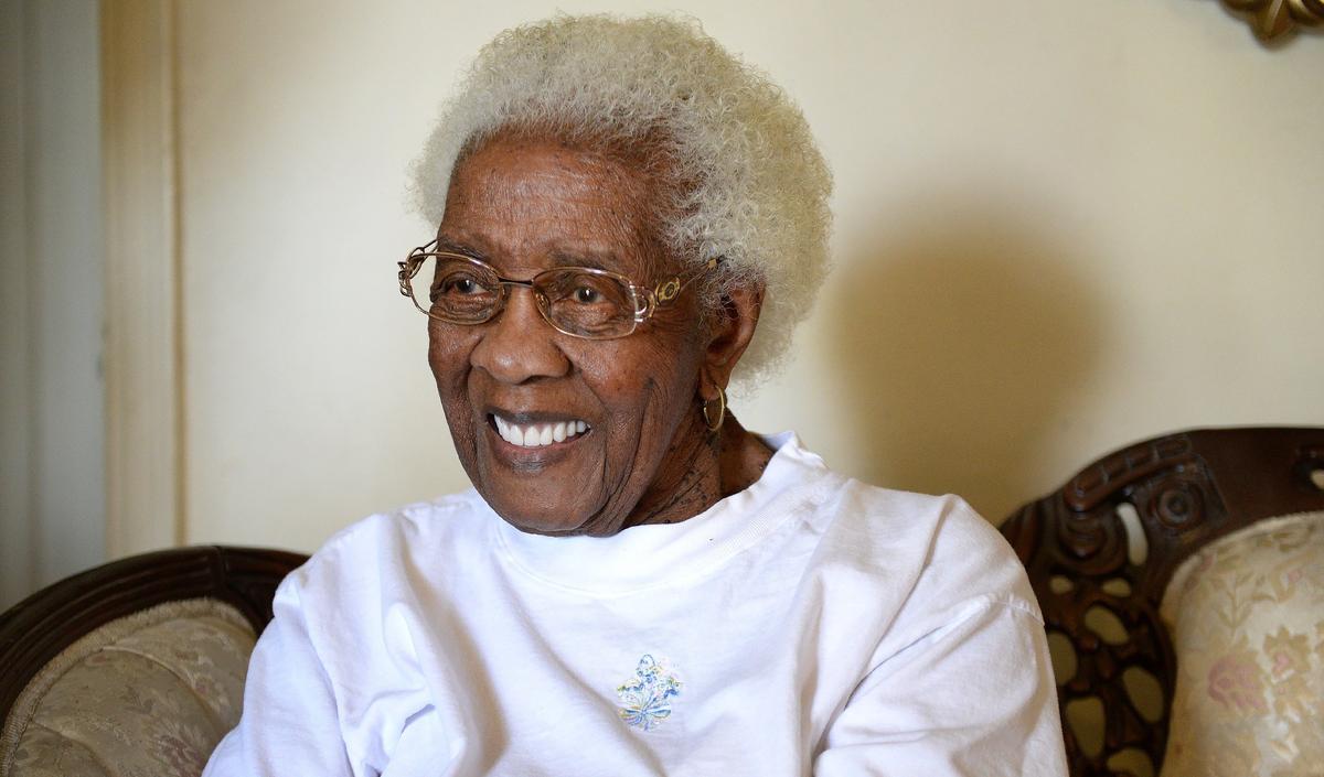 Corine Burton Reed smiles while reminiscing about raising her family at her southwest Fresno home, on Tuesday, Oct. 23, 2018. Reed is turning 100 on Monday.