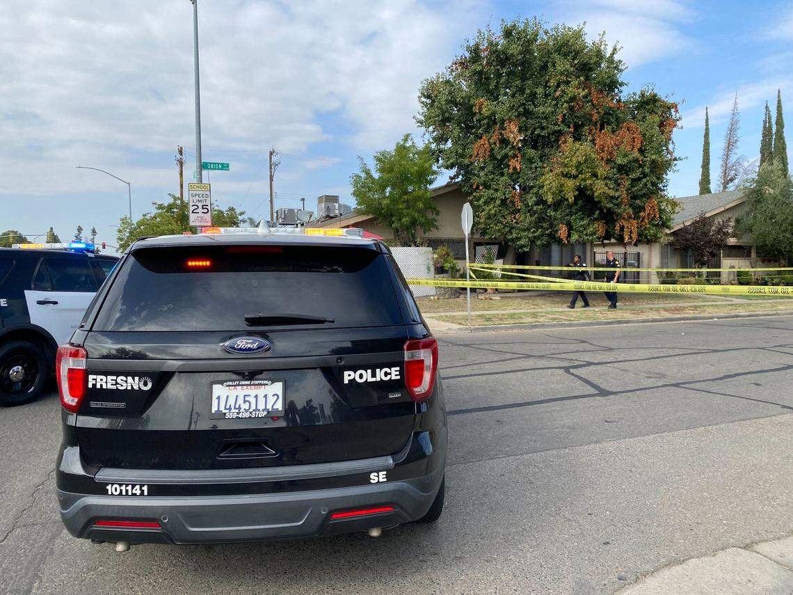 Police officers respond to the scene of a homicide in the 4200 block of East Union Avenue near Cedar and Clinton avenues in Fresno, California, on Monday, Sept. 18, 2023.