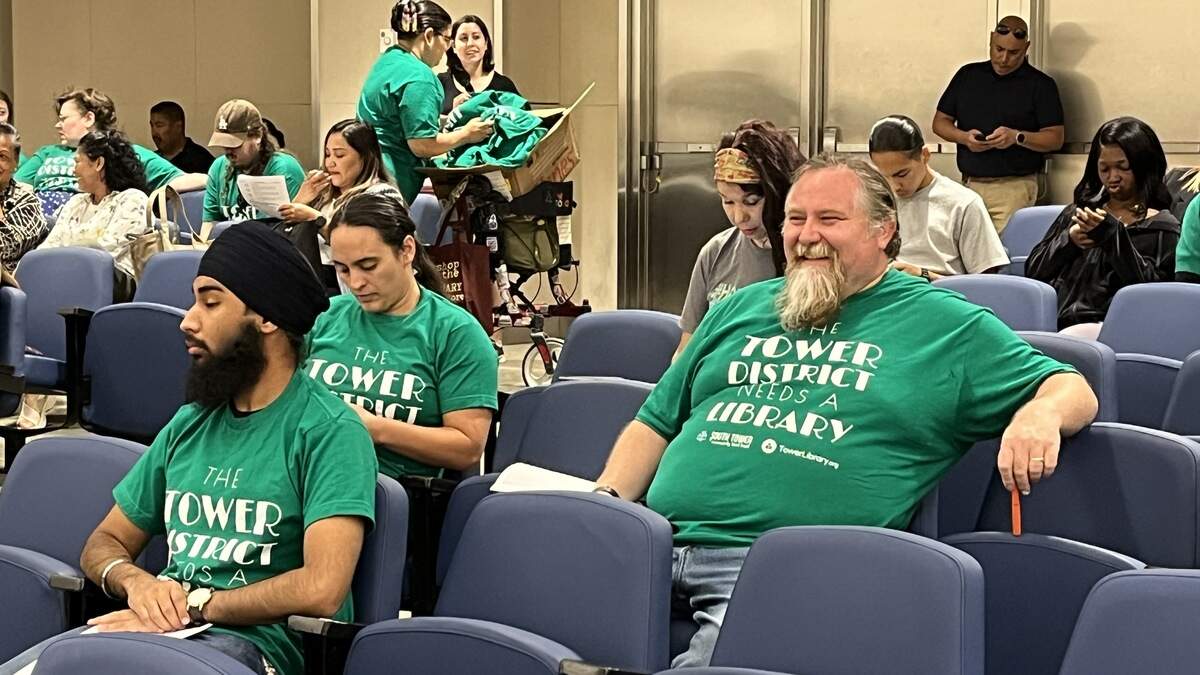 Diljot Singh Rai, left, Yania Escobar and Kiel Lopez-Schmidt advocate for a Tower District library at the June 16, 2026, Fresno City Council budget hearing.