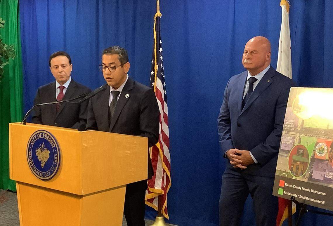 Fresno City Councilmember Miguel Arias discusses concerns over relocating a county-approved needle exchange program to a site on Fulton Street in downtown Fresno and its possible effects on nearby businesses and the city’s efforts to revitalize the area. He was joined at a press conference on Monday, Sept. 11, 2023 by Fresno City Councilmember Garry Bredefeld, left, and Mayor Jerry Dyer.