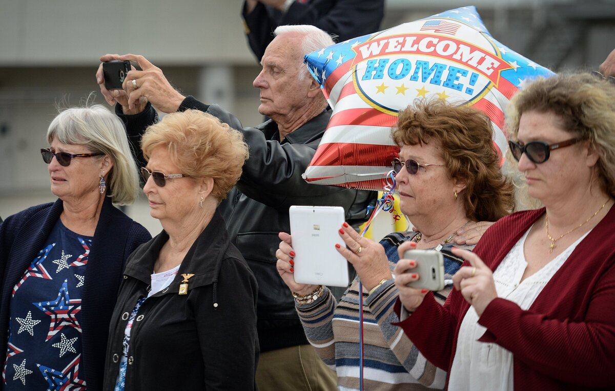 Family members of U.S. Marine Alva Jackson “Jack” Cremean watch as a jet carrying his remains arrives at Fresno-Yosemite International Airport on Wednesday, Dec. 5, 2018. Cremean was killed while aboard the USS Oklahoma during the Pearl Harbor attack of Dec. 7, 1941. His remains were identified nearly 77 years after his death via DNA. He will be laid to rest on Friday, Dec. 7, 2018 at Madera’s Arbor Vitae Cemetery with full military honors.