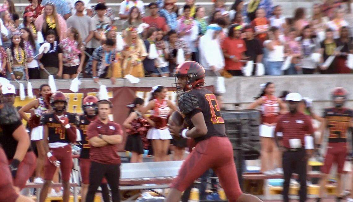Clovis West quarterback JJ Howard gets ready to throw a pass against Liberty-Bakersfield on Thursday, Aug. 29, 2024.