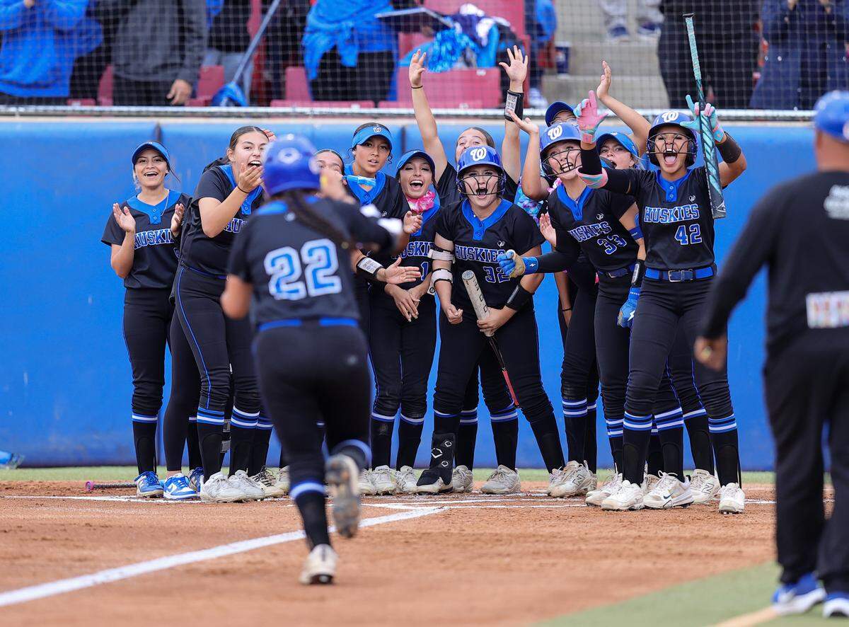 LSU-bound Karmen Vazquez comes home after hitting a solo home run in the top of the first inning for Hanford West against Chowchilla in the Central Section Division III championship.