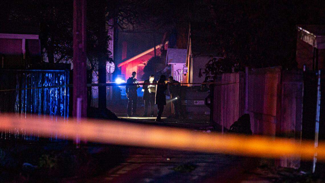 Fresno police investigate a homicide in a Tower District alleyway where an officer found a man shot multiple times near Van Ness and Belmont Avenues on Friday, Jan 21, 2022.