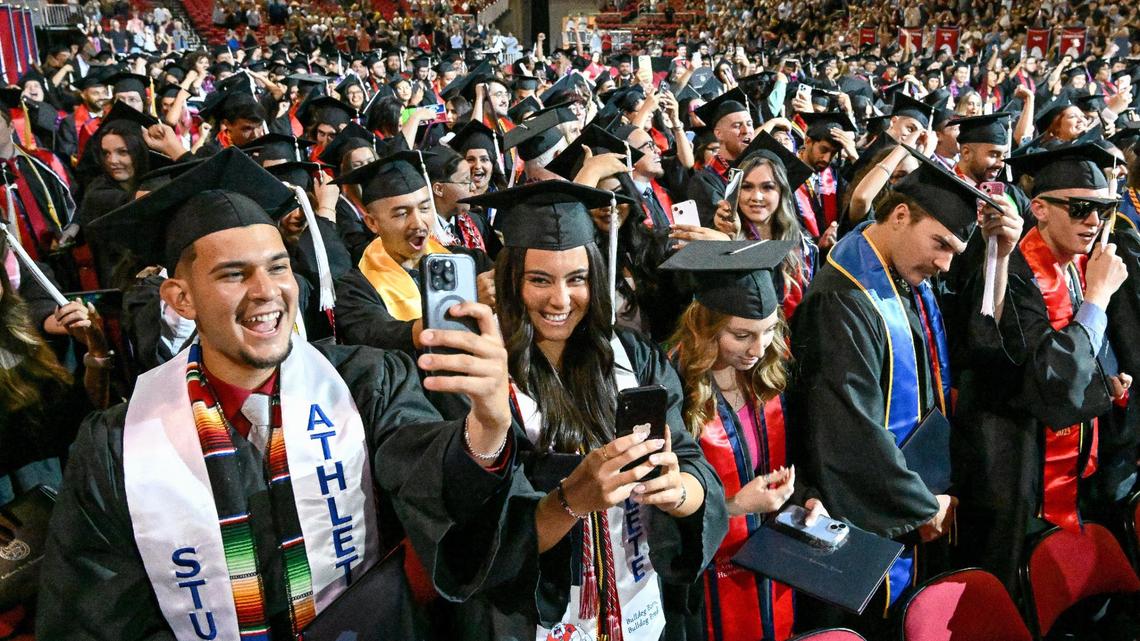 Graduates cheer, take selfies and celebrate after turning their tassels as official graduates during Fresno State’s College of Arts & Humanities graduation ceremony at the Save Mart Center last May.