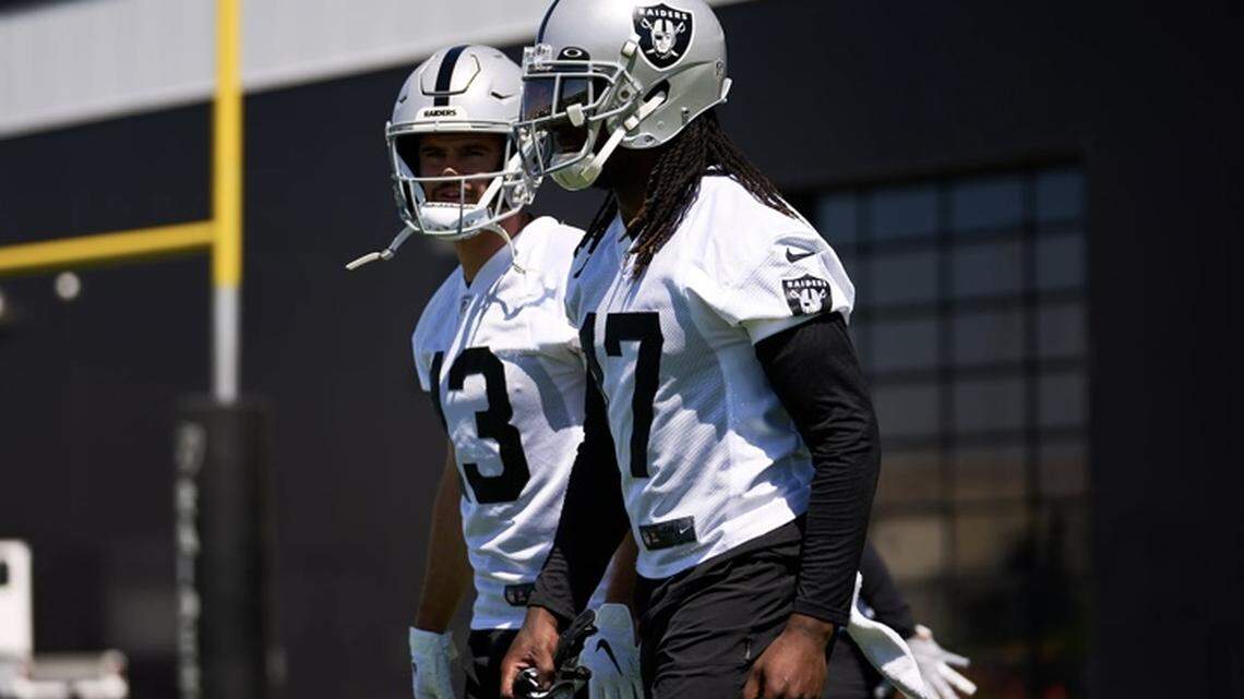 Las Vegas Raiders wide receivers Davante Adams and Hunter Renfrow at organized team activities in Henderson, Nev.