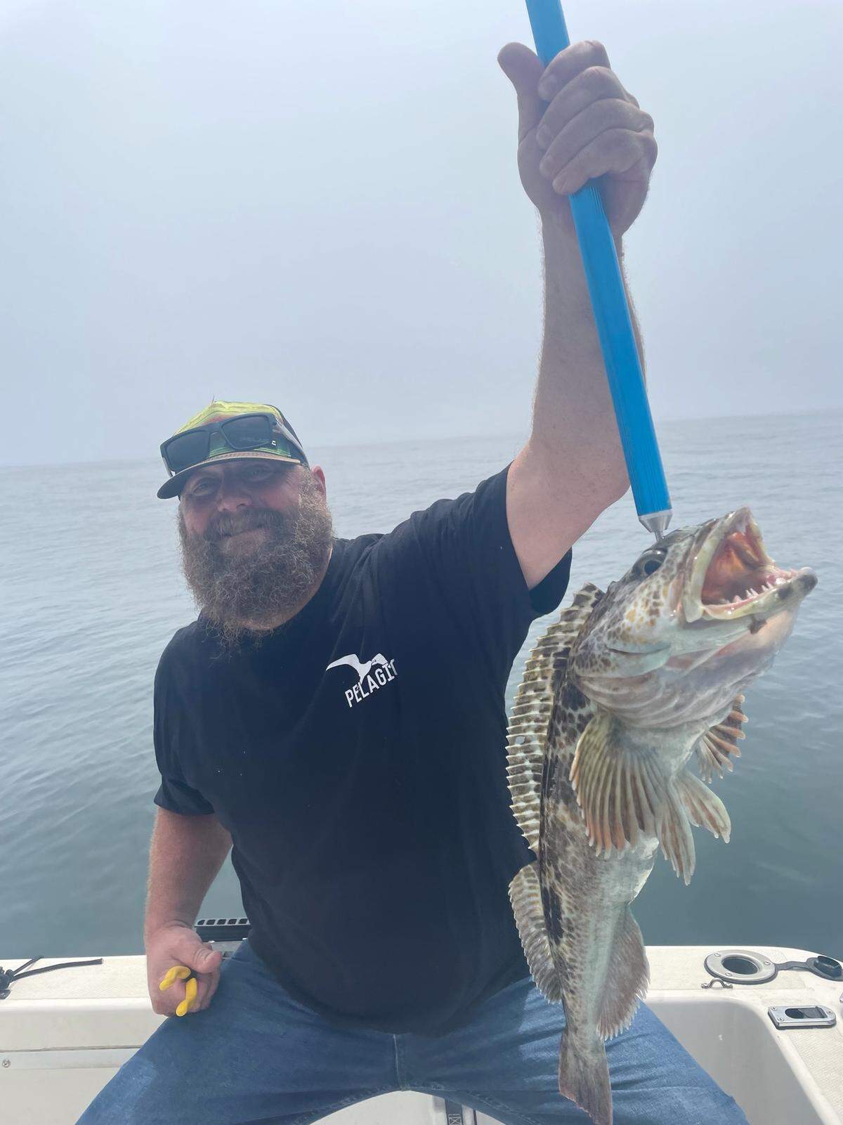 James Gatto of Visalia displays a ling cod caught aboard his brother-in-law Jason Bailey’s boat out of Morro Bay on Aug. 8. The duo hauled in two limits of rockfish, including some big reds and four lings.