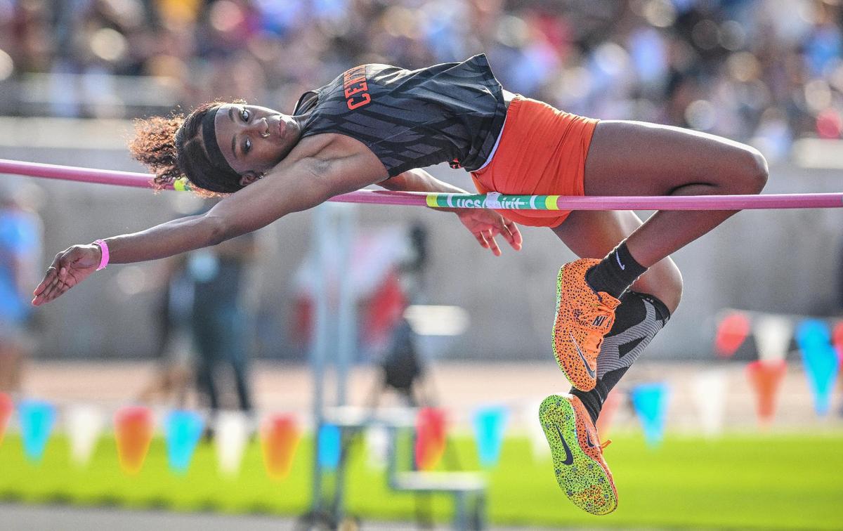 Central East’s Illicia Ross hits the bar while attempting a high jump during the CIF state track & field finals at Buchanan’s Veterans Memorial Stadium on Saturday, May 31, 2025.