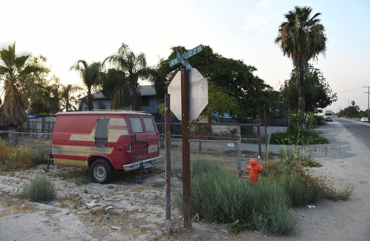 An intersection on the south side of the community, photographed Friday, Aug. 13, 2021 in Tulare County’s Okieville.