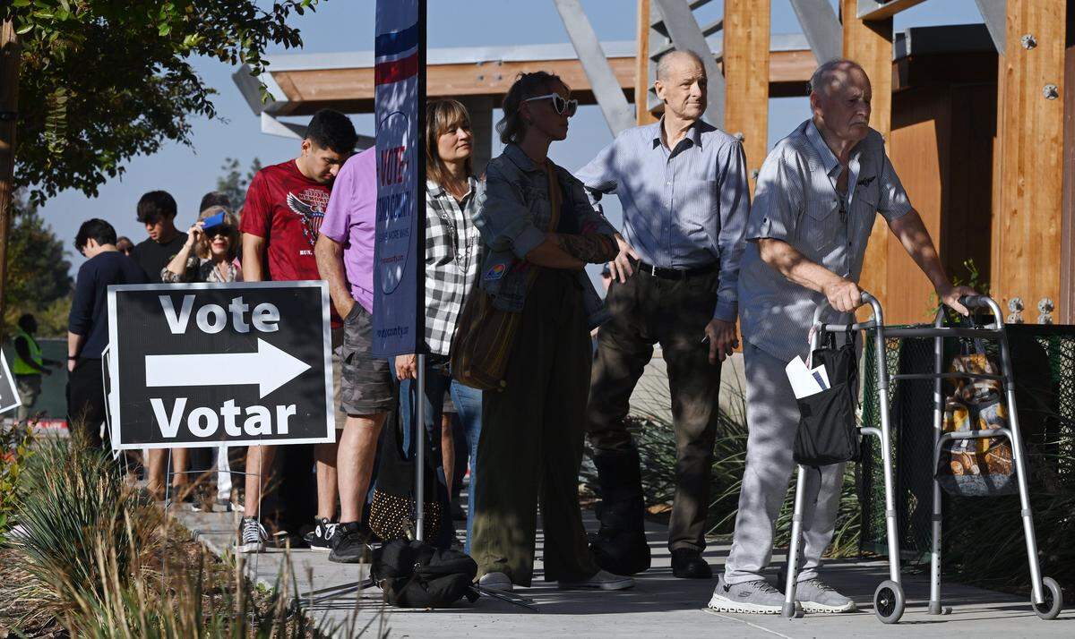 A long line of voters wait outside the Clovis Transit Center to vote Tuesday, Nov. 4, 2025 in Clovis.