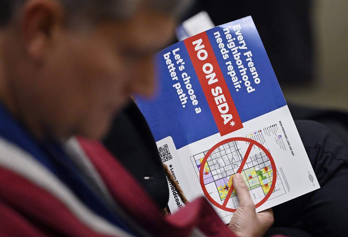 Hundreds gather for a special Fresno City Council meeting allowing the public to voice concerns for the Southeast Development Area (SEDA) plan, held at Fresno City Hall Thursday evening, Dec. 18, 2025 in Fresno.