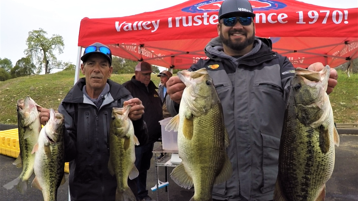 Chuck Fuller and Jonathan Whitesitt show their winning stringer of 22.72 pounds including Big Fish of 7.82 pounds at the Christian Bass League tournament March 19 at Tulloch Lake.