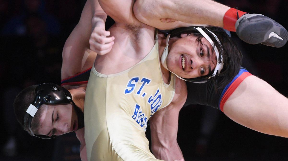 In a file photo, Buchanan’s Sloan Swan, background, wrestles St. John Bosco’s Nicco Ruiz in the 152-pound weight class at the 2022 CIF state championships. Swan placed third at 173s at the Doc B Invitational on Saturday, Jan. 7, 2023.