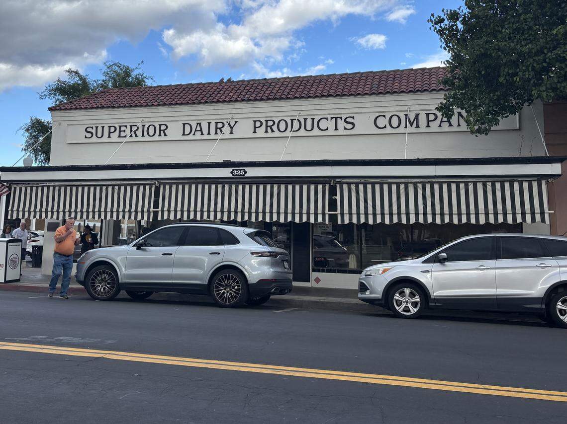 Loyal customers crowed the beloved business on its last open day for a chance to step foot inside the building one more time, get their favorite massive scoops treats, take photos of the nostalgic famous pink booths and pink stools or take home copies of the old Superior Dairy menus as souvenirs before renovations on April 12, 2026.