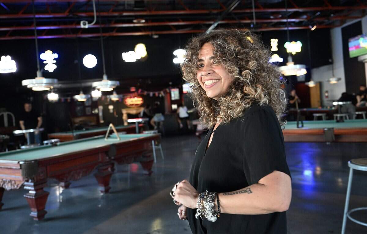 Lisa Tackett is the owner of the new The Enchanted Pour which takes over in the former Detention Billiards location on Olive Avenue in the Tower District, photographed Thursday, June 25, 2026 in Fresno.