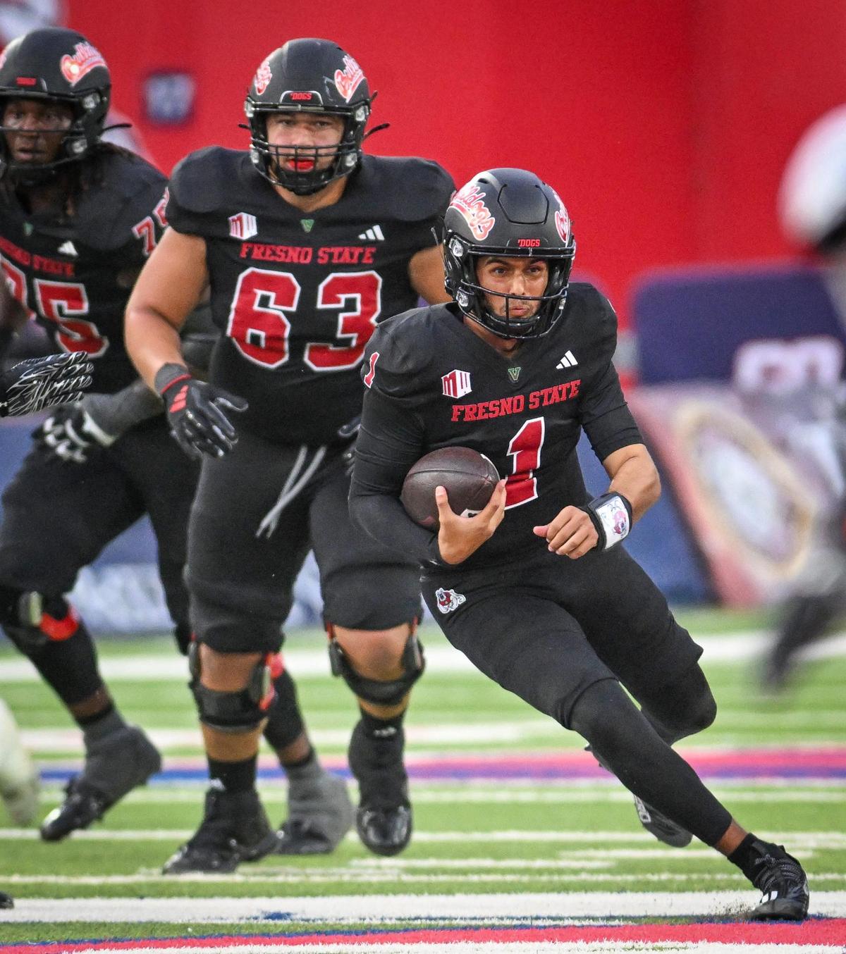 Fresno State quarterback Mikey Keene takes the ball on a keeper against San José State during their game at Valley Children’s Stadium in Fresno on Saturday, Oct. 26, 2024.