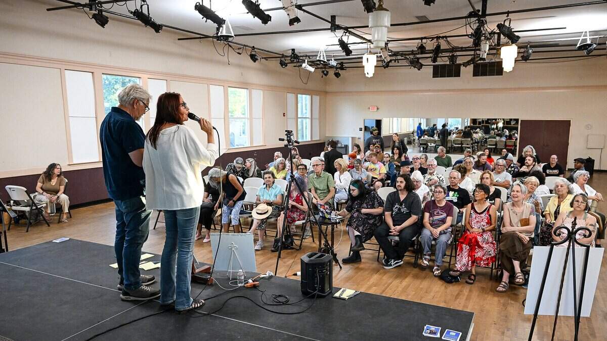 Debi Ruud and her husband John Alden of the Fresno Music Academy & Arts speak to an audience of community members and students the Severance School of Dance building in Fresno's Tower District on Tuesday, July 7, 2026. The meeting was held at the recently purchased building to get ideas and answer questions about their plan to move their music school into the building.