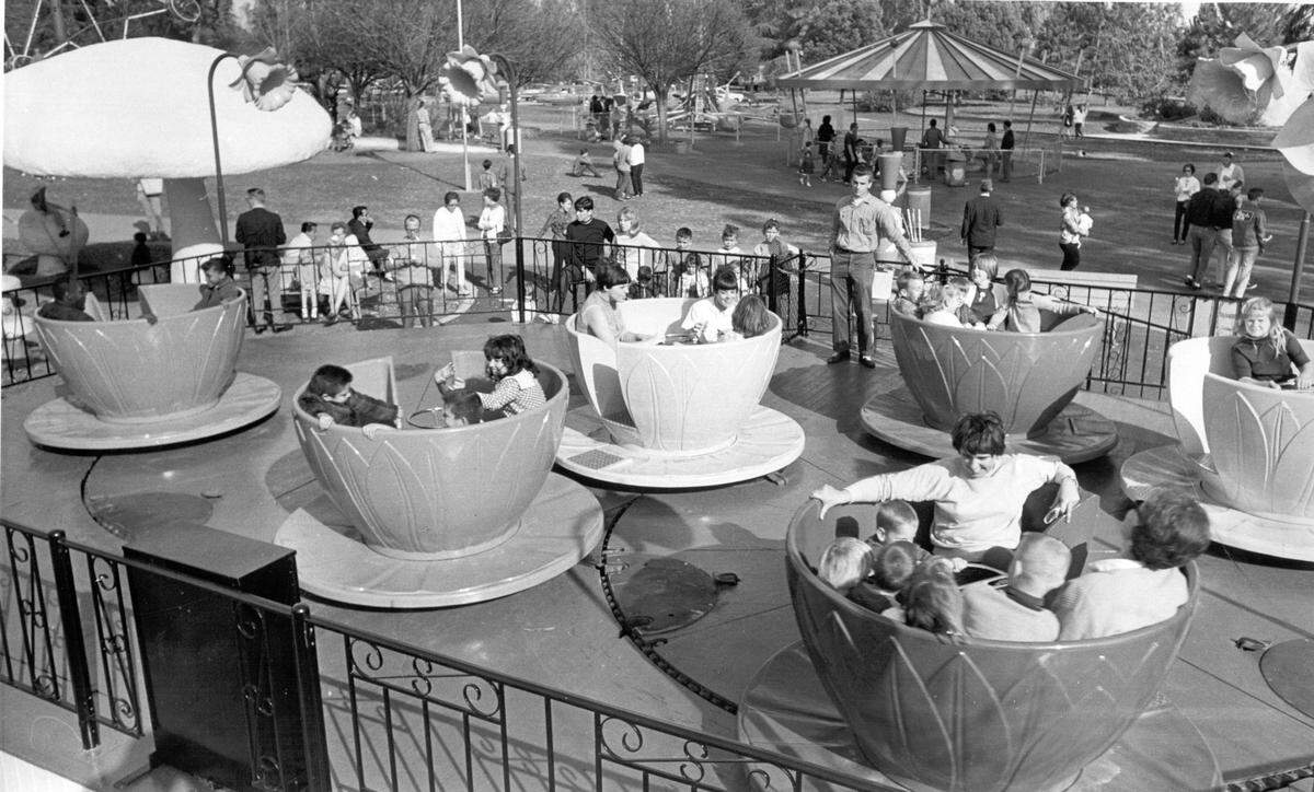 Crazy Dazy - The spinning cups in Rotary Playland’s newest addition give the younger generation-and some of their elders, a real whirl for there money. PUB: 3/9/1968