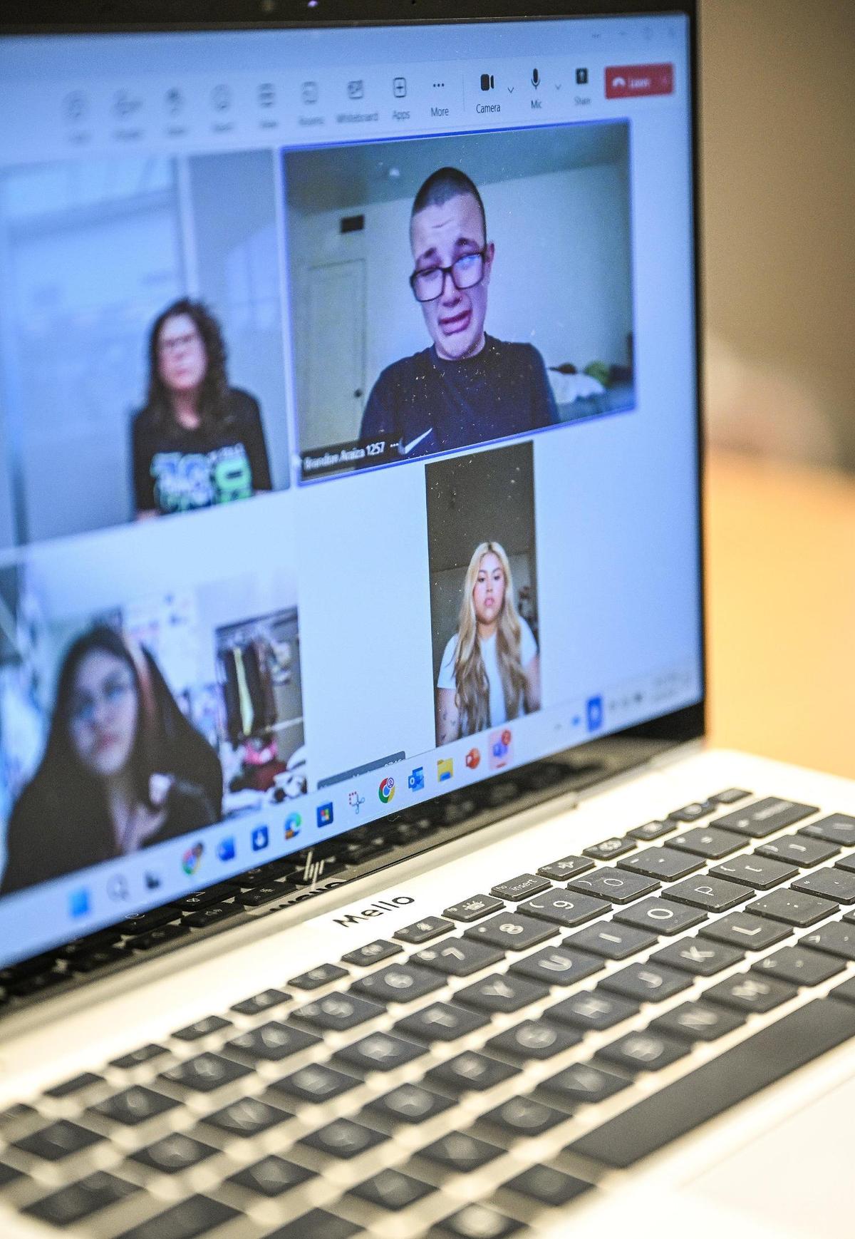 Students give personal stories on how online education has helped them solve issues with on-site education while speaking with their English teacher Cyndi Mello at Farber Educational Campus on Monday, June 9, 2025.