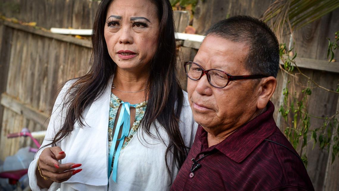 Community activist Paula Yang interprets for Cha Lee Xiong, who talks abou this son Kou Xiong who was one of the victims in last Sunday’s mass shooting.