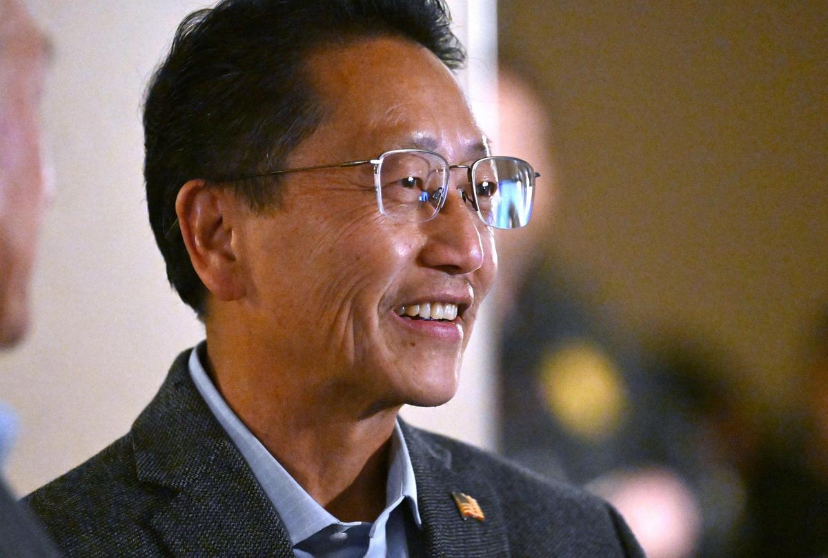 Fresno City Council District 5 candidate Brandon Vang smiles as he waits with supporters for the results of the special runoff election Tuesday night, March 18, 2025 in Fresno.