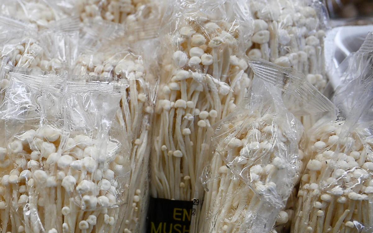 Enoki mushrooms for sale in the produce section of Central Fish Tuesday, April 29, 2025 in Fresno.
