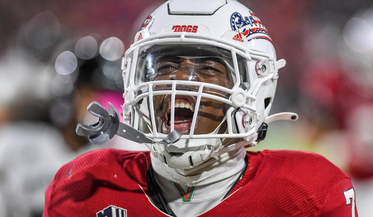 Fresno State’s Jordan Mims yells triumphantly after scoring a touchdown against Hawaii in the first half of their game at Valley Children’s Stadium on Saturday, Nov. 5, 2022.
