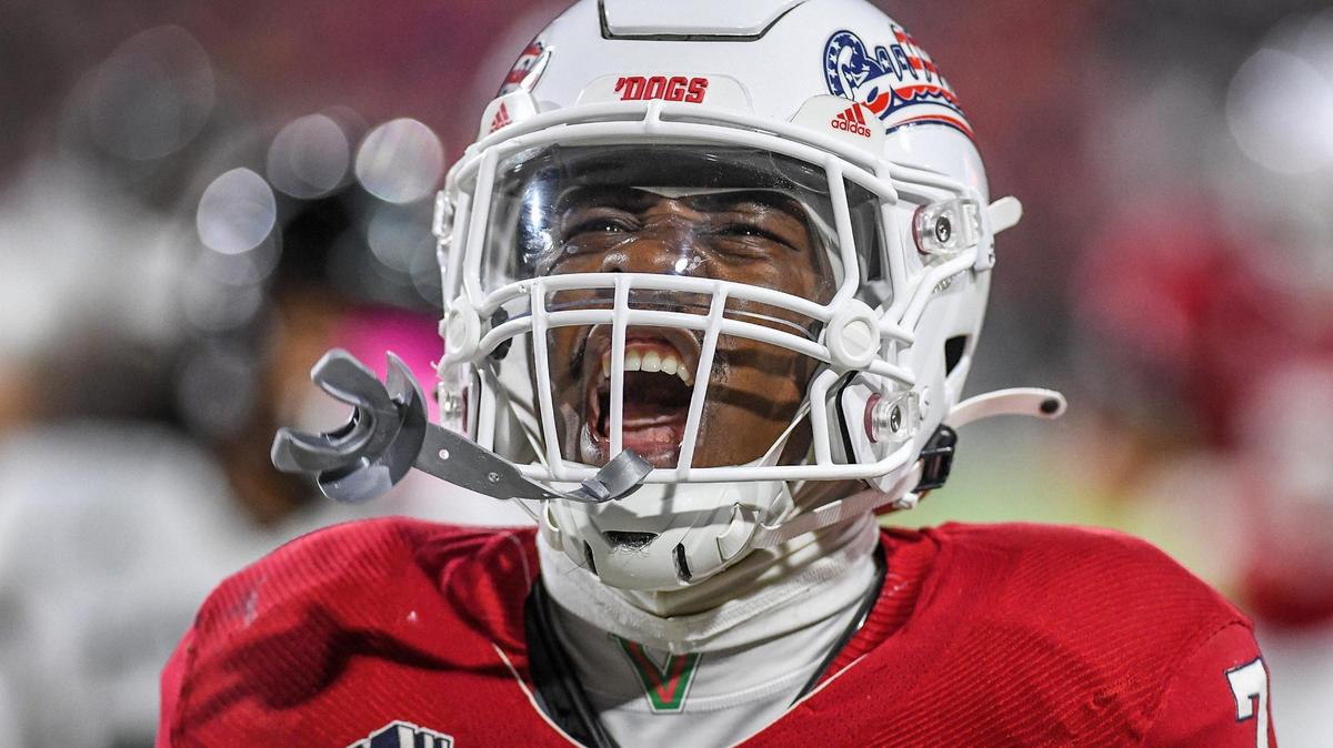 Fresno State’s Jordan Mims yells triumphantly after scoring a touchdown against Hawaii in the first half of their game at Valley Children’s Stadium on Saturday, Nov. 5, 2022.