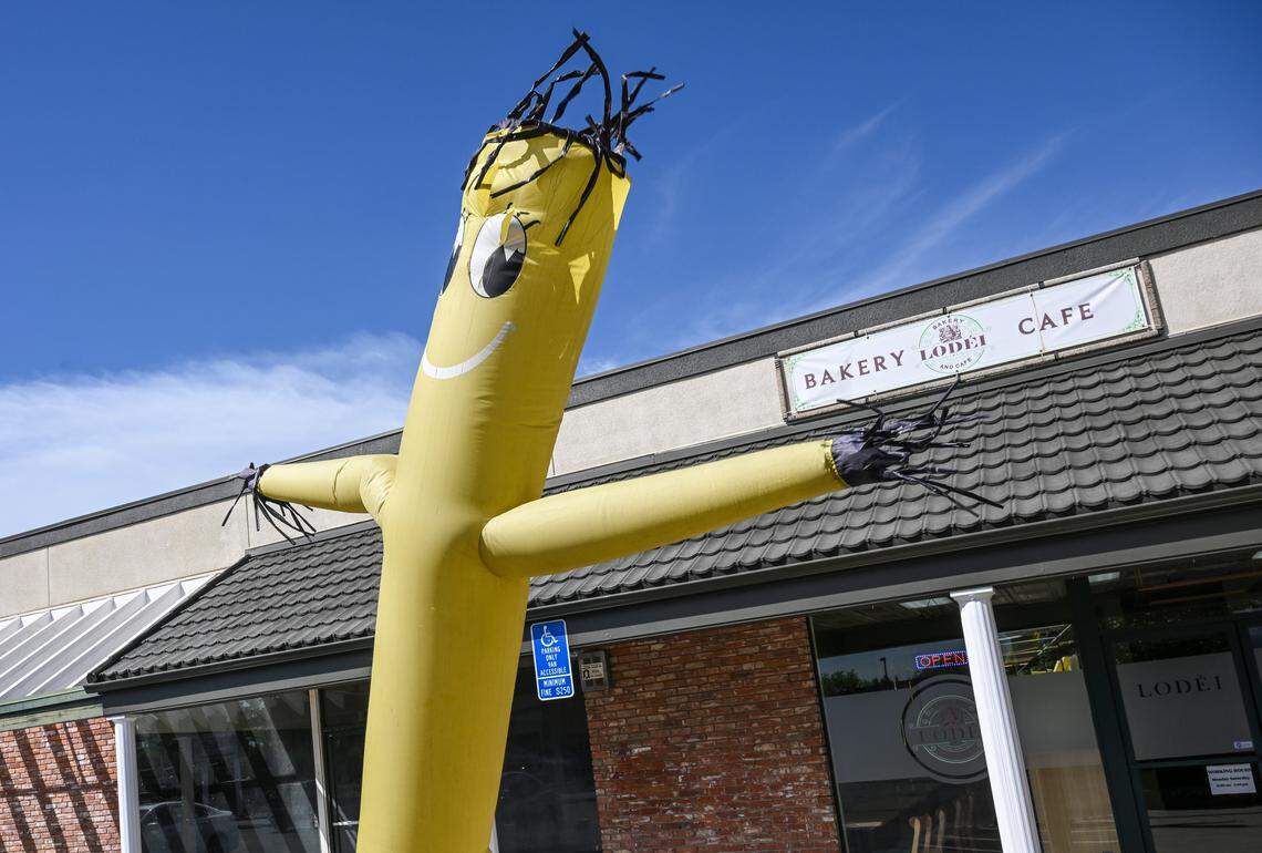 Lodei Bakery & Cafe has been trying to bring more business to their location on the northeast corner of Palm and Bullard with signs and even an inflatable tube man.