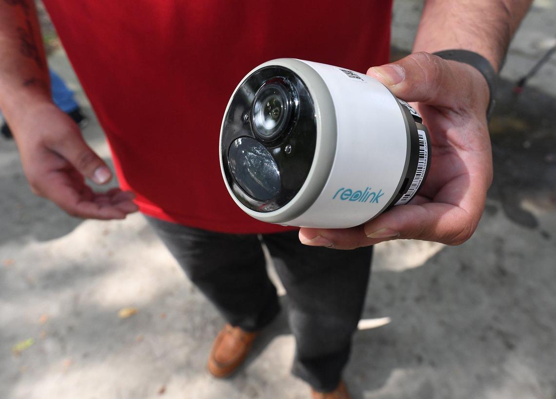 Pablo Villagrana shows one of the security cameras that will be installed on a Fresno mobile street vendor’s cart, prior to the press conference at the Mosqueda Center, Wednesday March 30, 2022, where the launching of a pilot program was announced for the safety of street food vendors who live and work in Fresno.