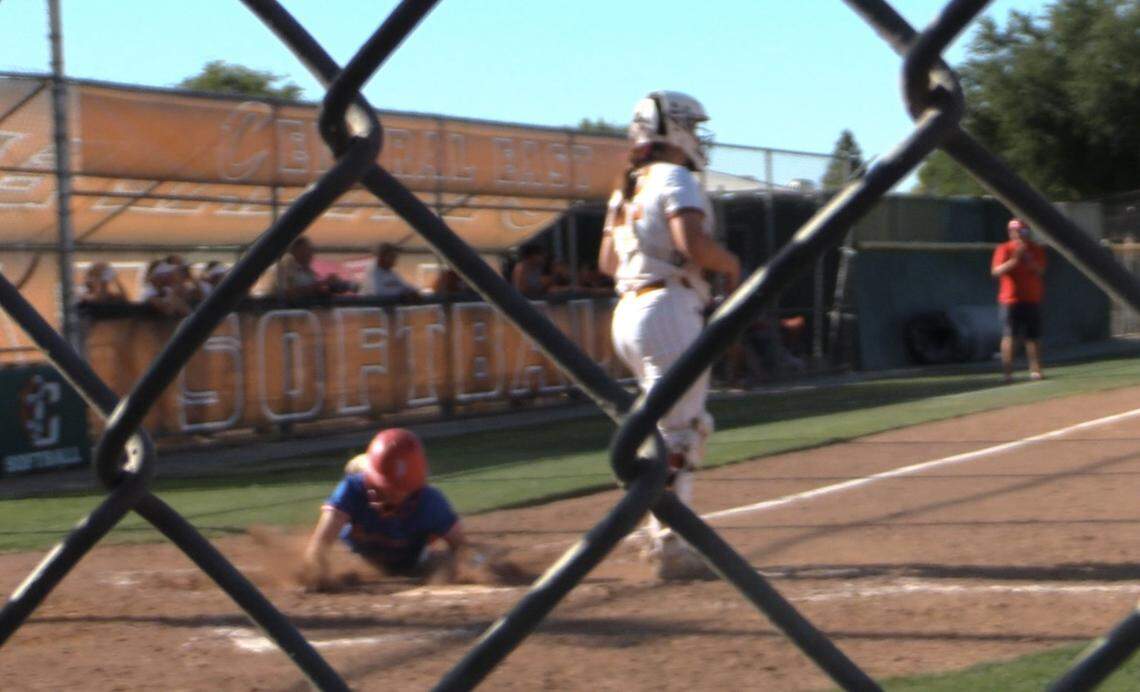 Brooklyn Ainsworth slides home in the top of the seventh inning for Buchanan High. The Bears defeated Central 6-4 in a Central Section Division I semifinal game on Thursday, May 22, 2025.