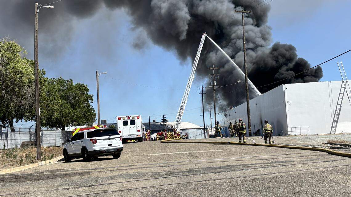 Two-alarm warehouse fire sends black smoke visible for miles near downtown Fresno