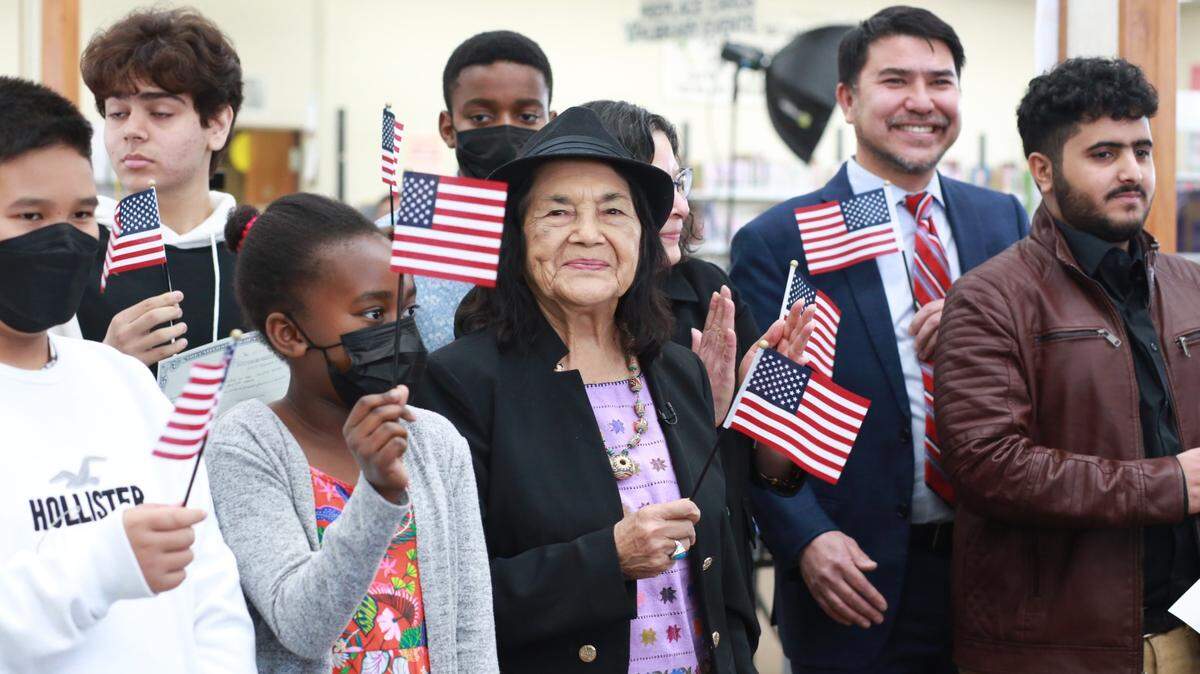 Central Valley’s newest U.S. citizens hear from civil rights icon Dolores Huerta, center, during the U.S. Citizenship and Immigration Services (USCIS) Special Children’s Ceremony Thursday afternoon at the Delano Branch Library.
