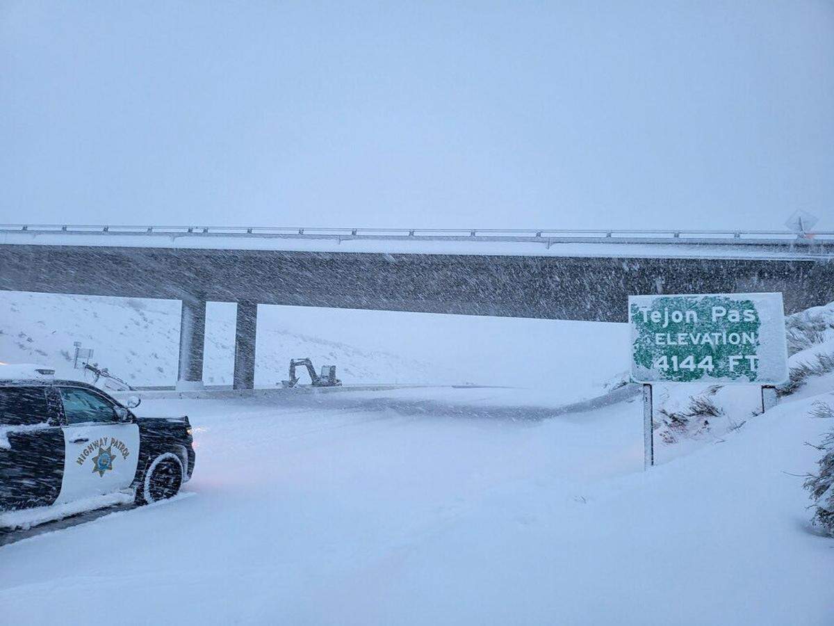 Snow builds up atop the Tejon Pass in this photo posted by the California Highway Patrol on Saturday, Feb. 25, 2023. Interstate 5 past the Grapevine and through the pass remained closed late Sunday.