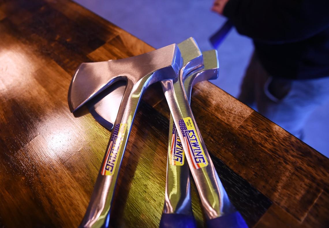 A collection of axes for use by customers at Bad Axe, located at the former Stevens Bicycles at Palm and Shields Avenues Tuesday, Feb. 6, 2019 in Fresno.